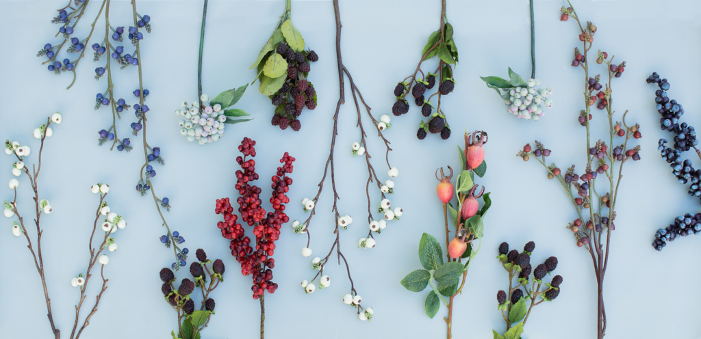 Tips on how to use artificial berries in flower arrangements