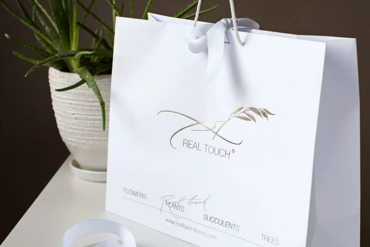 Embossed corporate package - white